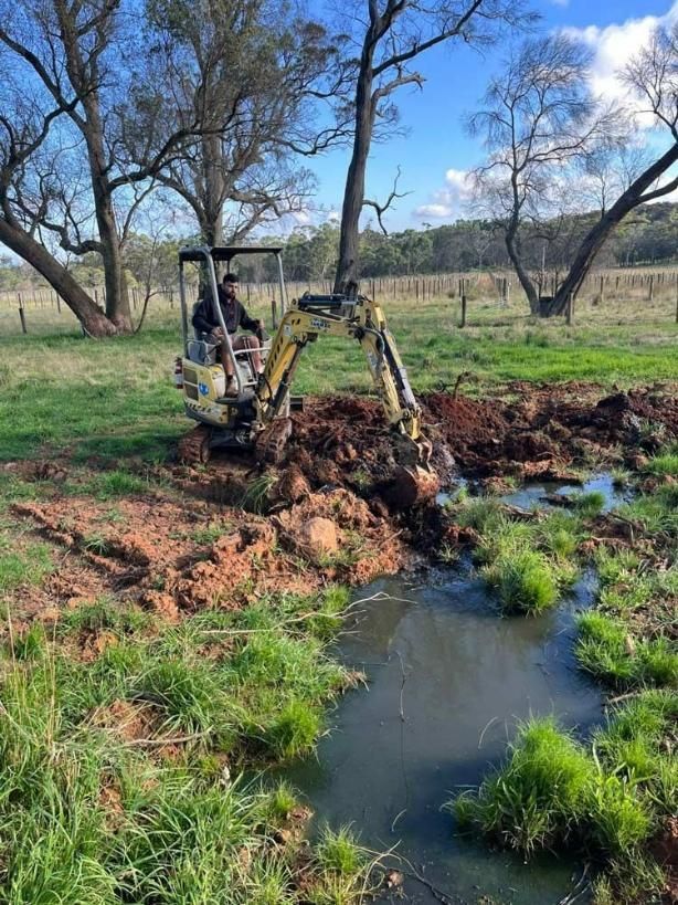 Man Using Excavator — About Time Plumbing & Civil Construction in Moss Vale, NSW