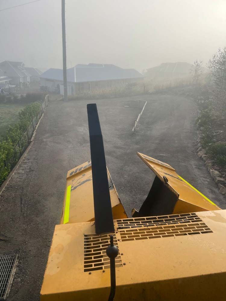 Using Heavy Machinery on Pavement — About Time Plumbing & Civil Construction in Moss Vale, NSW