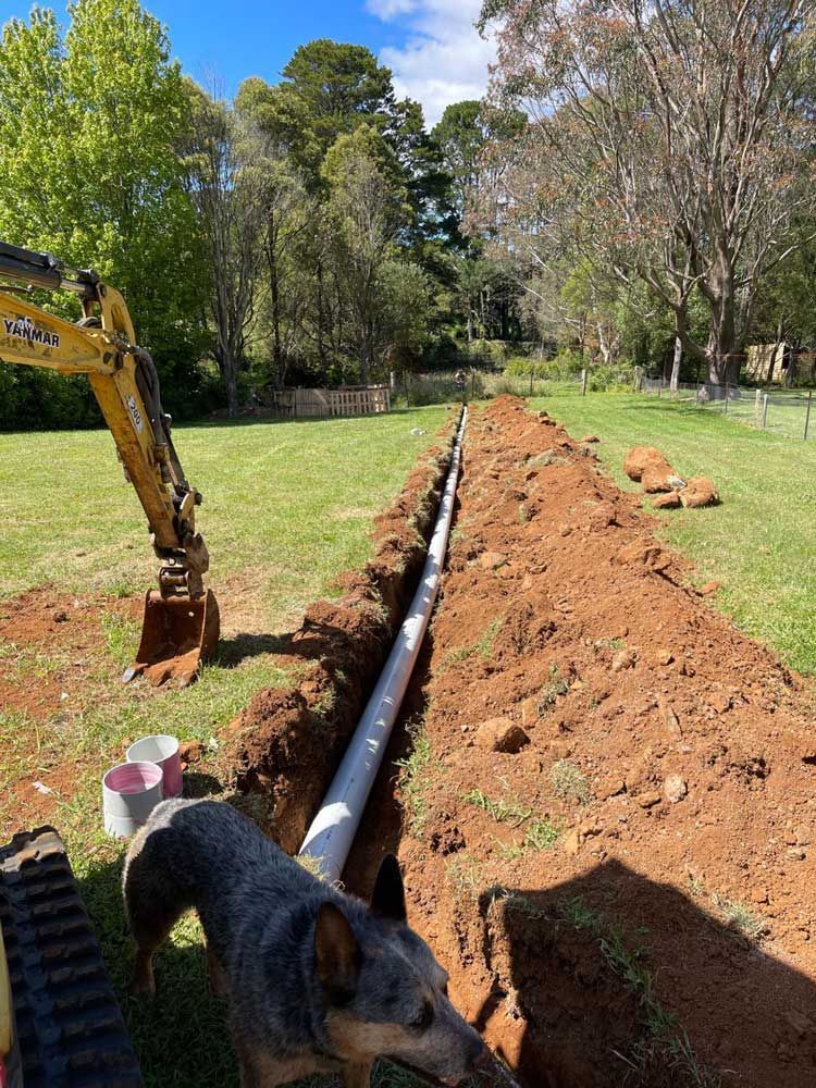 Laying Down Pipe — About Time Plumbing & Civil Construction in Moss Vale, NSW