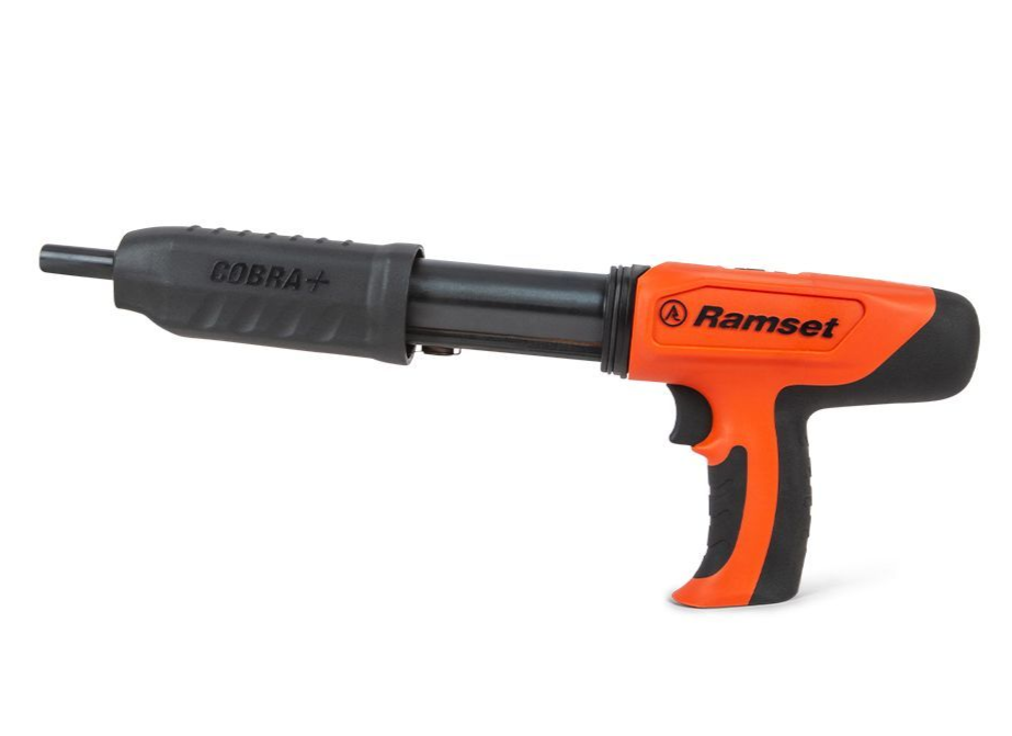 Orange Ramset tool kit with gun, case, safety glasses, and cleaning supplies.