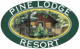 Pine lodge resort logo with a log cabin in the background