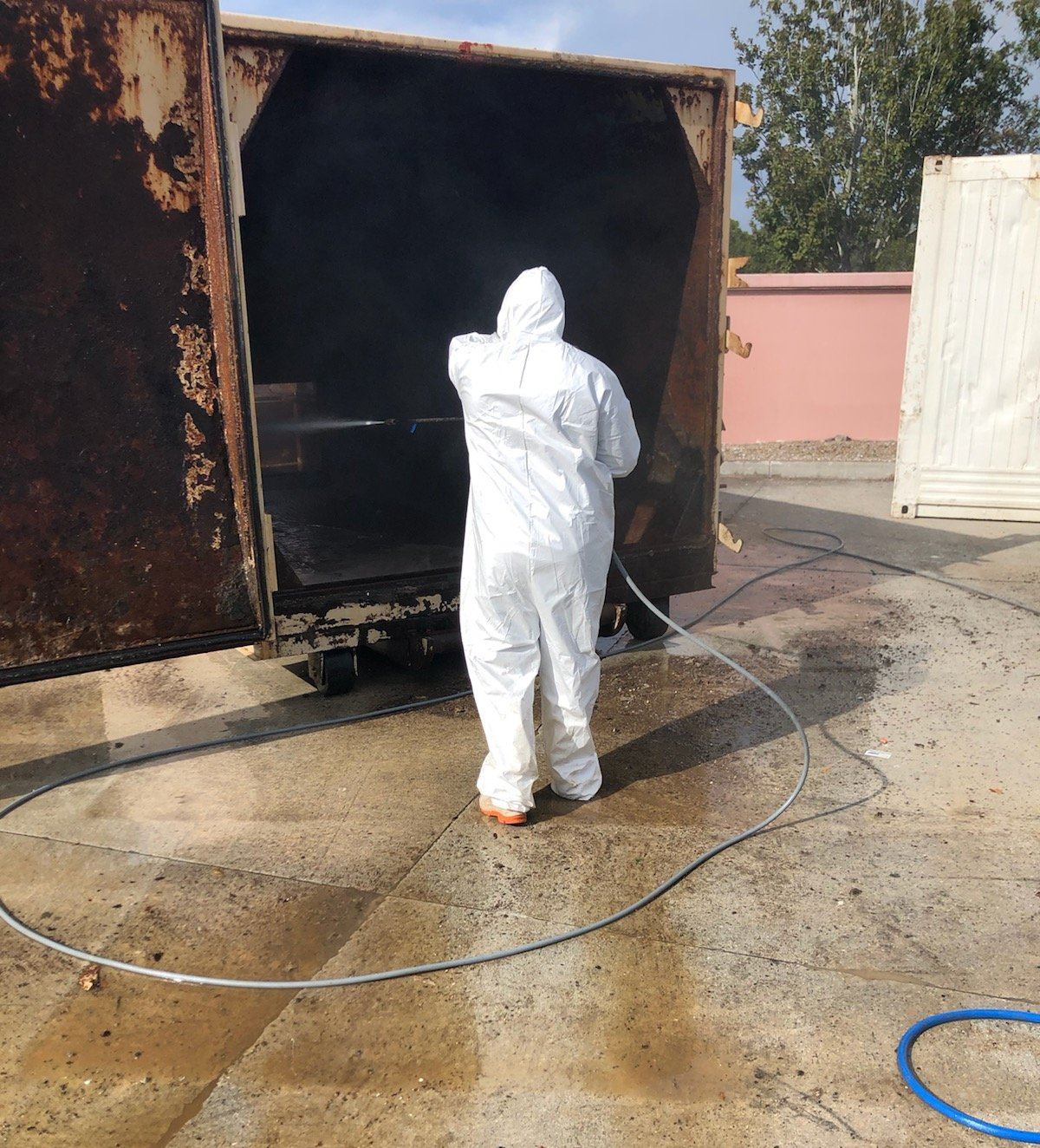 Power washing a Compactor