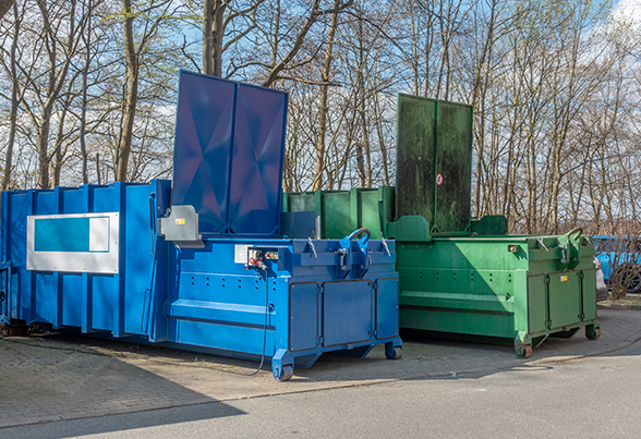 Two Large Garbage Compactors — USA — Emergency Dumpsters For Less