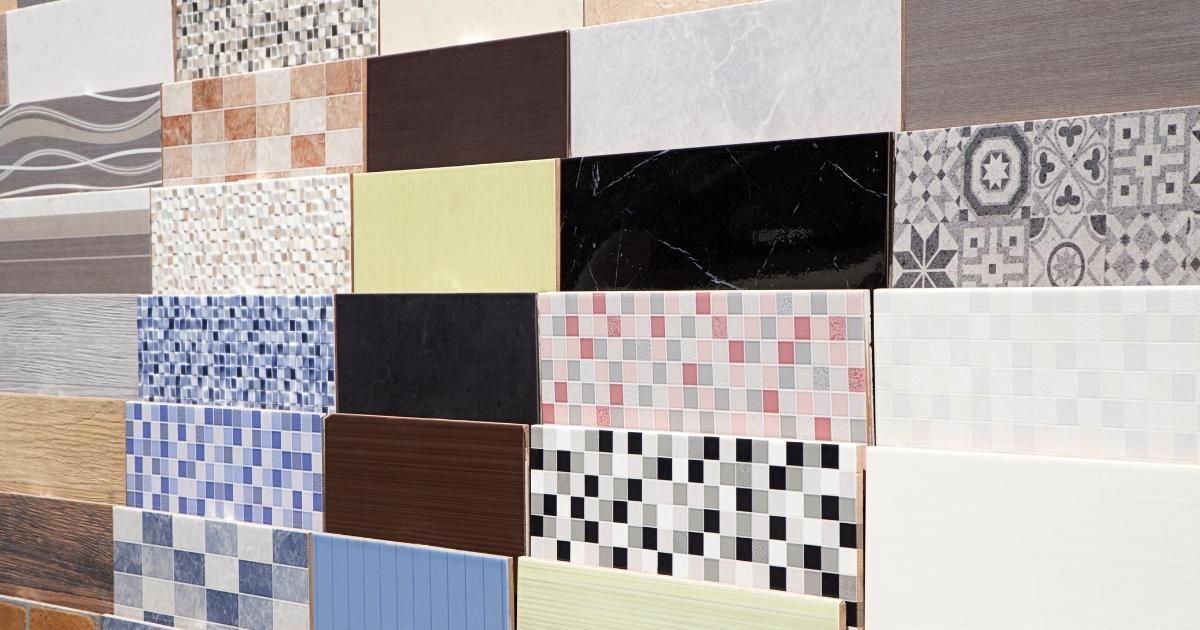 Tiles of various colors and patterns displayed, showcasing design options.
