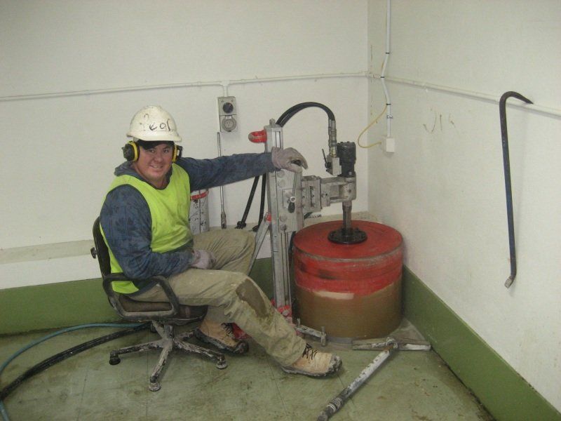 Contractor sitting next to the machine