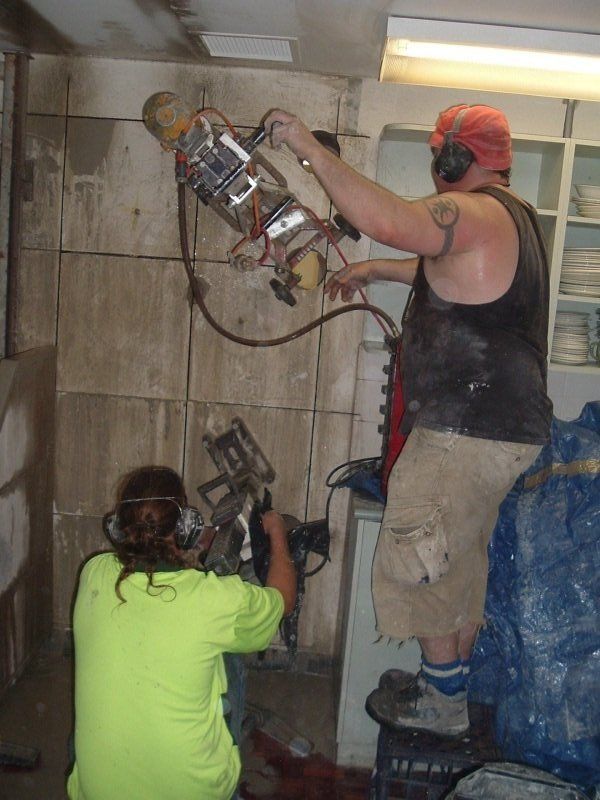 Contractor working with machine in home renovation