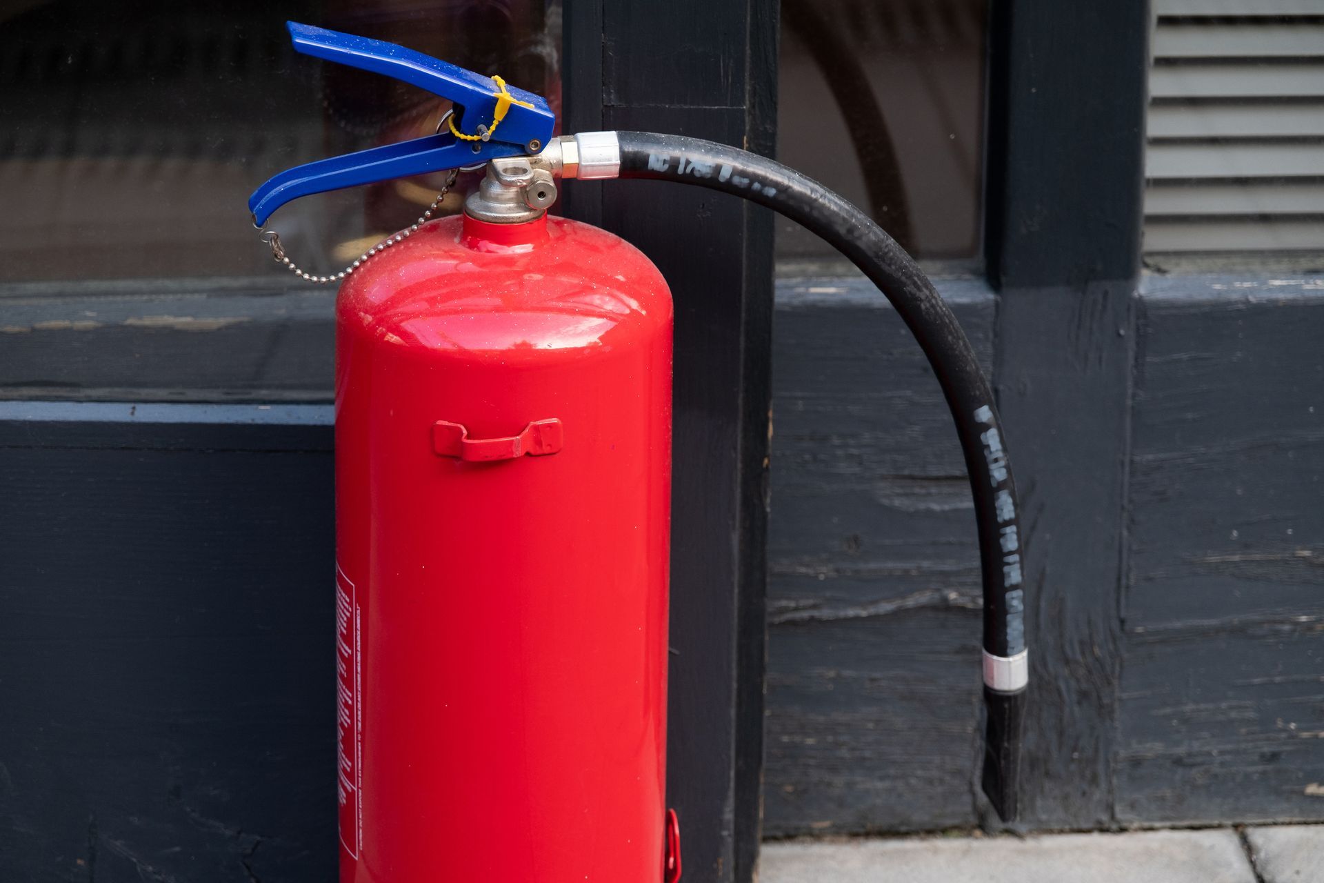 Fire Extinguisher Preparing to Prevent Fire — Montrose, CO — Frontline Fire Defense