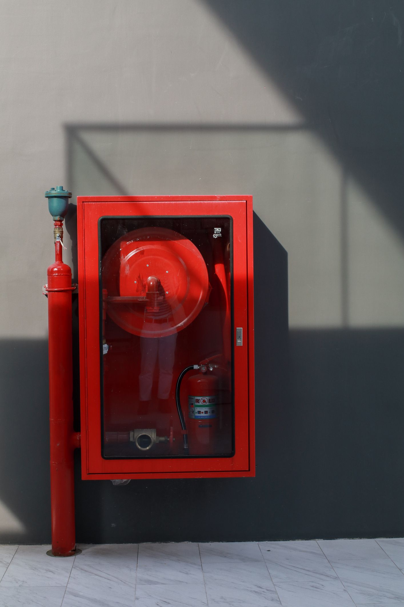 Fire Extinguisher System on Concrete Wall — Montrose, CO — Frontline Fire Defense
