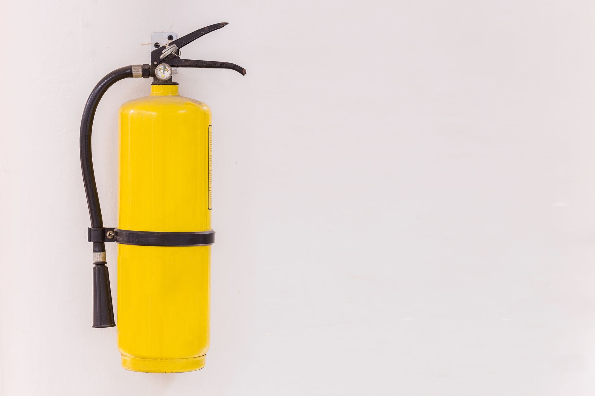 Yellow Fire Extinguisher — Montrose, CO — Frontline Fire Defense