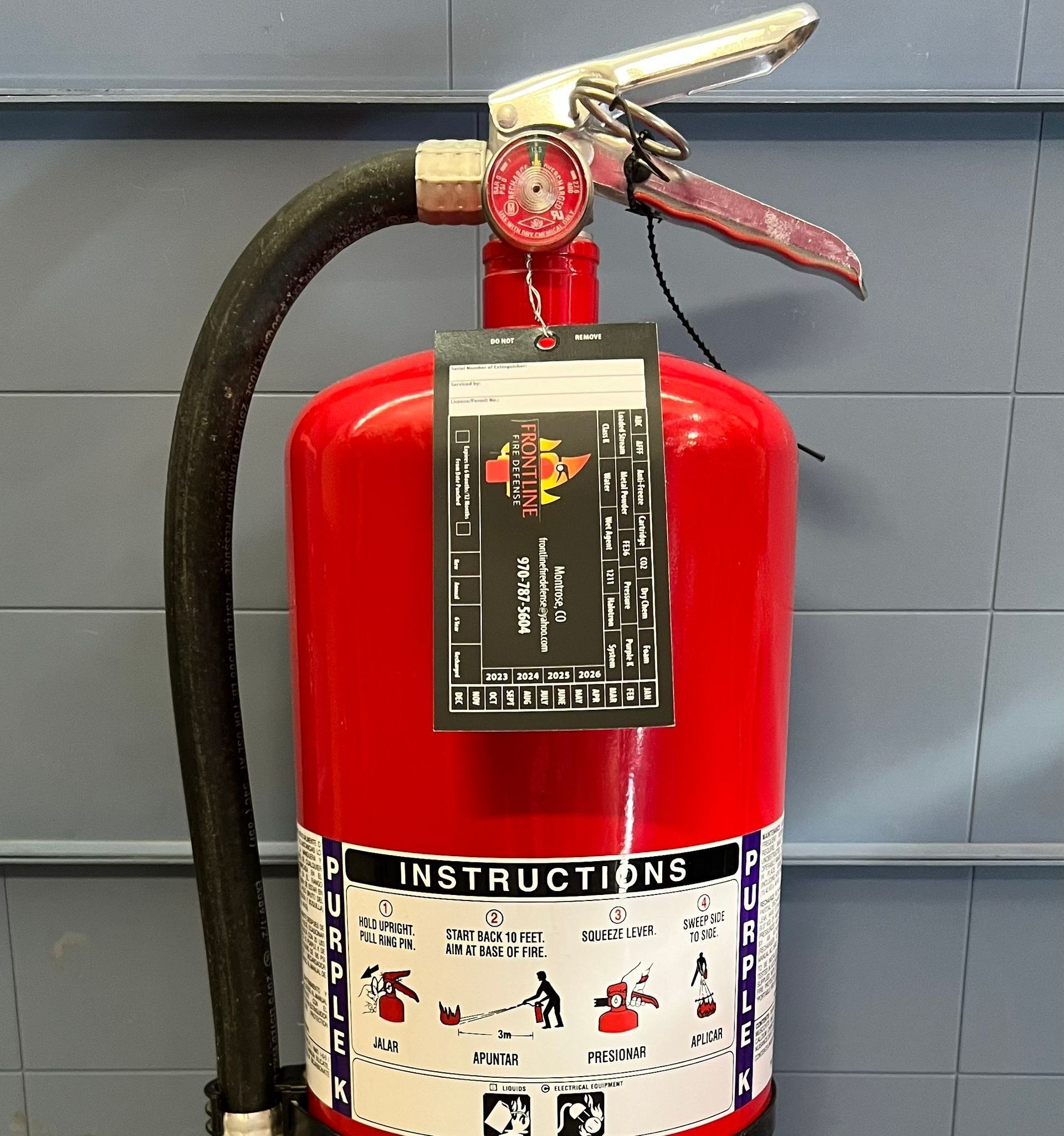 Green Fire Extinguisher — Montrose, CO — Frontline Fire Defense