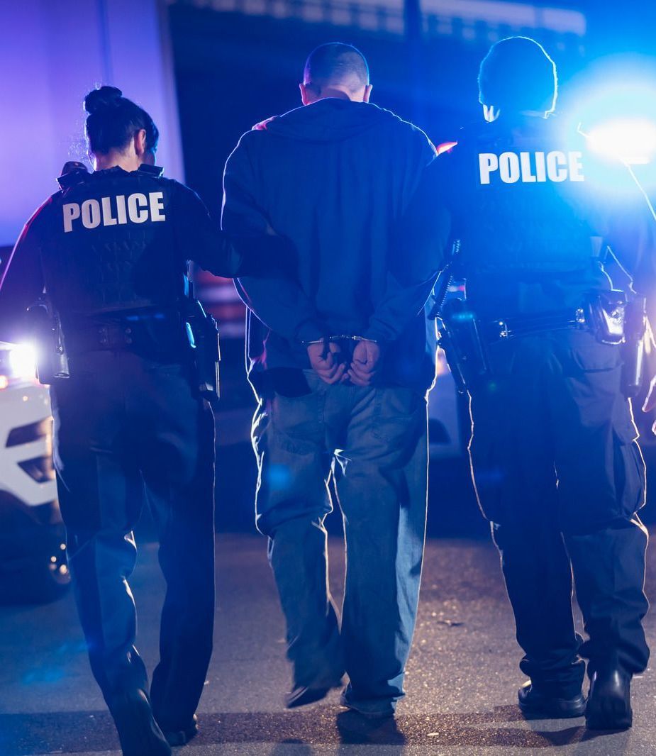 A group of police officers standing next to each other