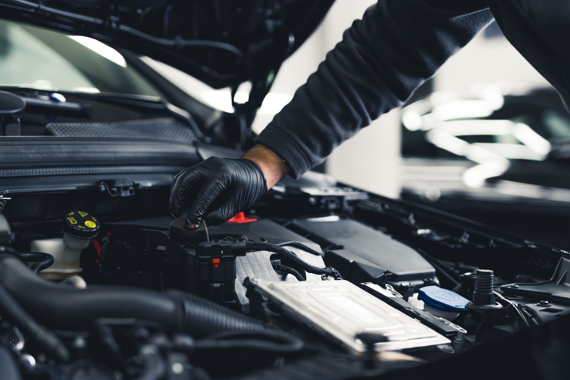 Working on the engine of a car
