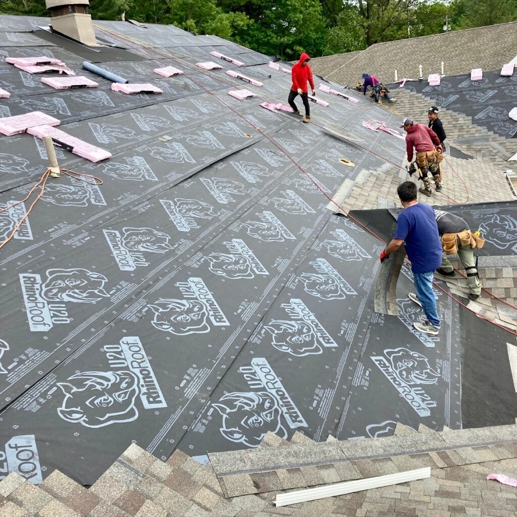 Worker Installing Roof — Edmond, OK — A. Mathis Roofing & Constructon