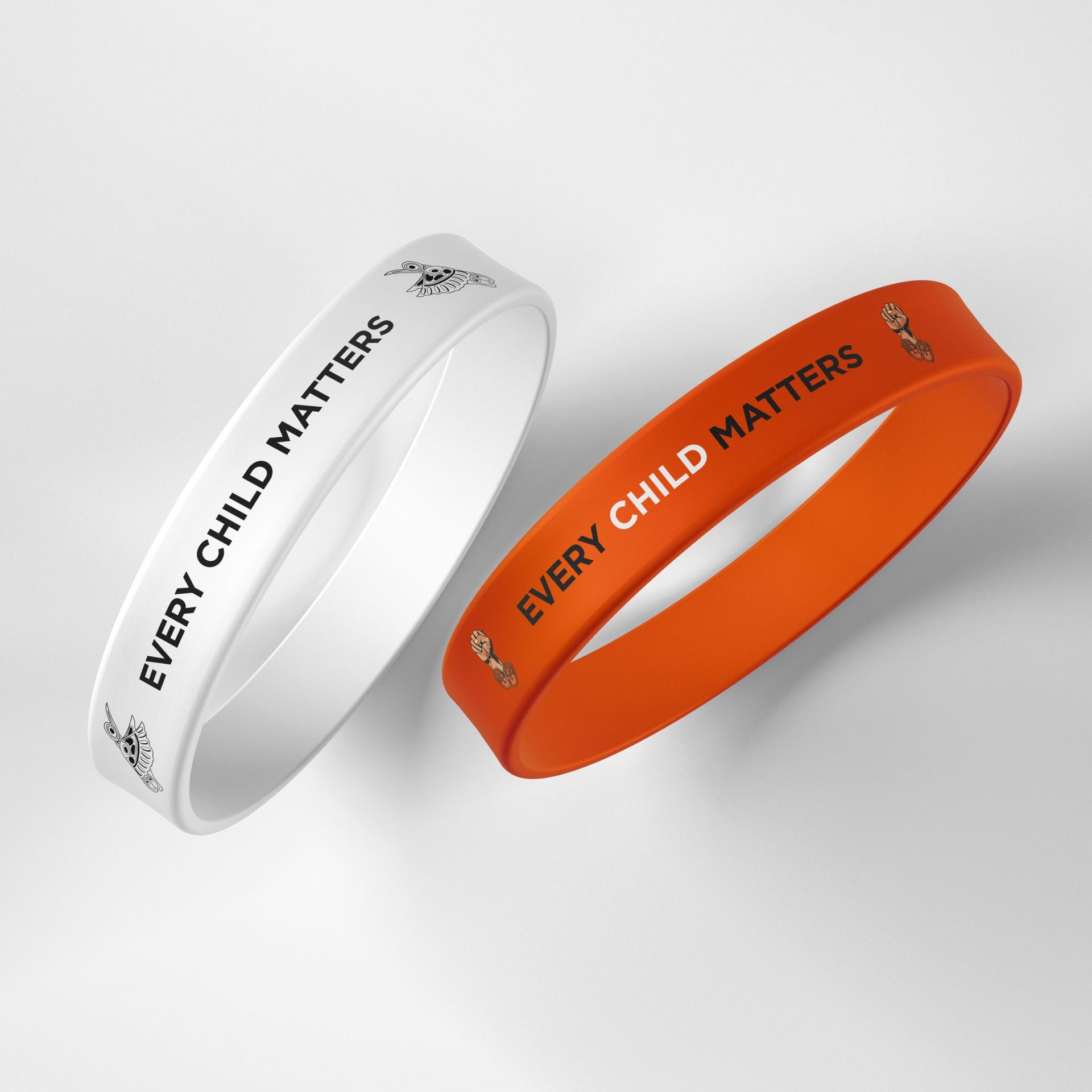 Two bracelets that say every child matters on them
