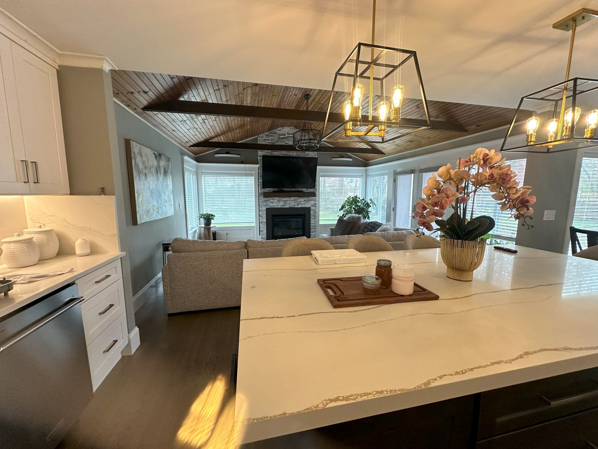 A kitchen with a large island in the middle of the room.