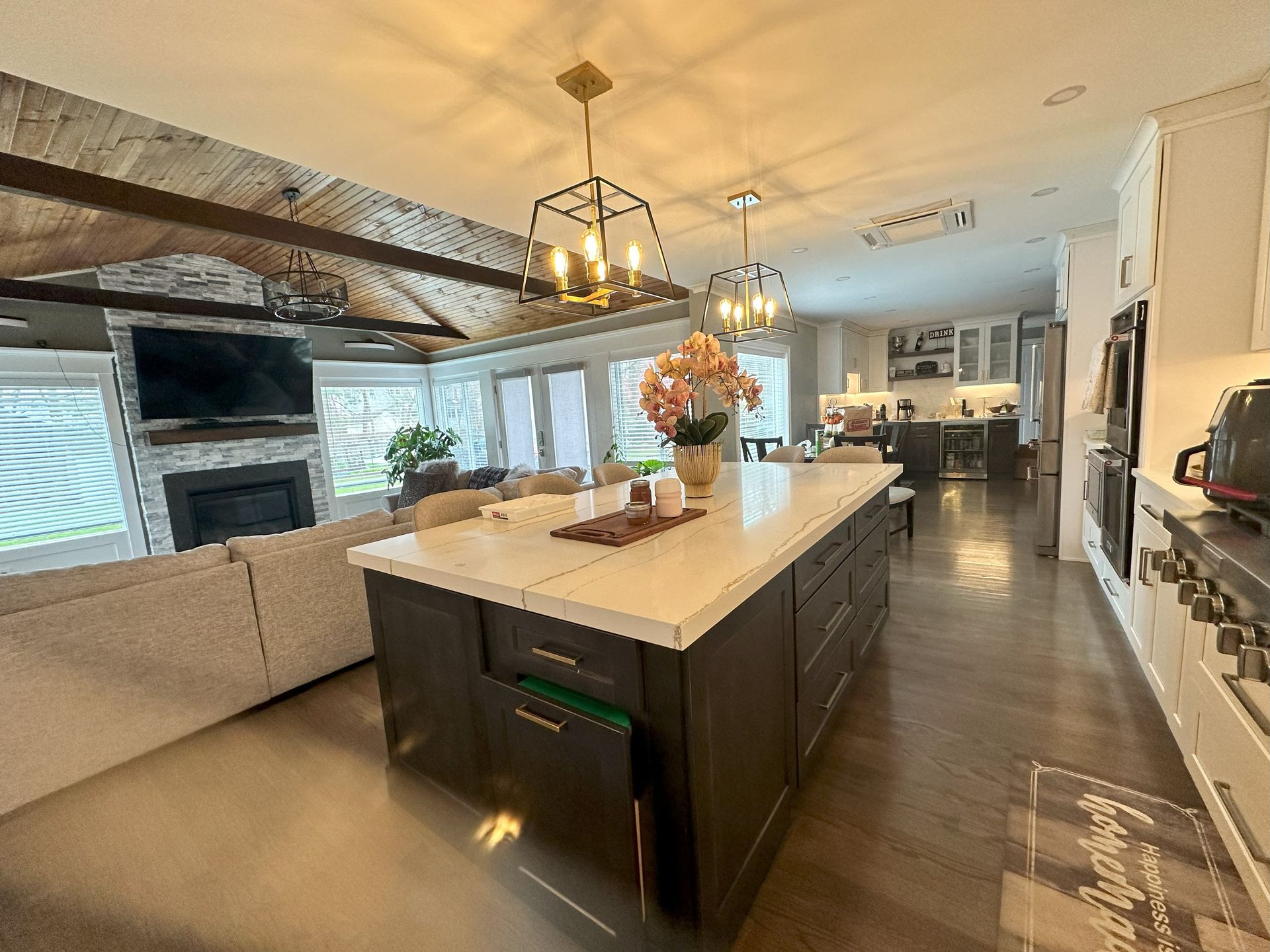 There is a large island in the middle of the kitchen.