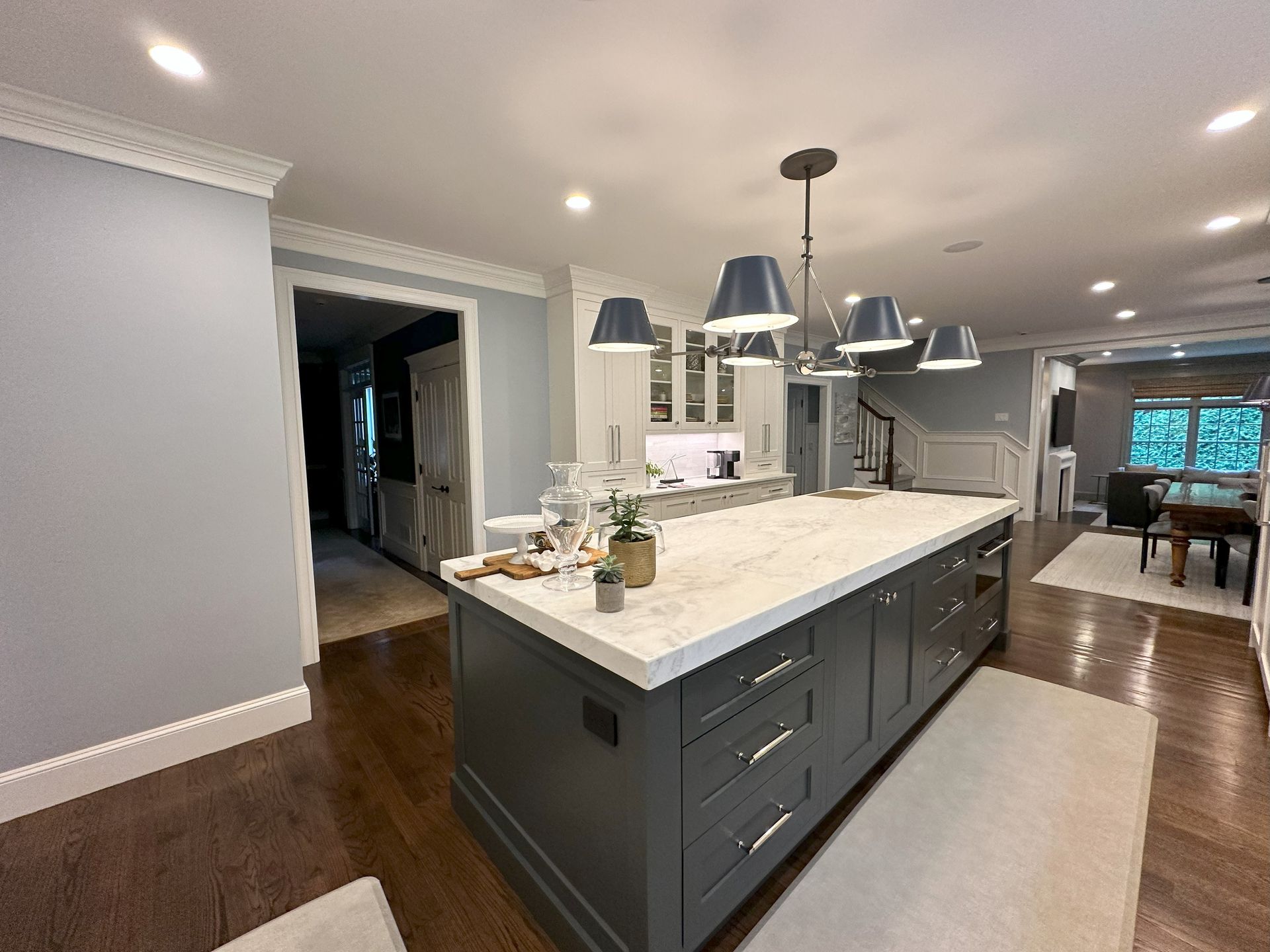 There is a large island in the middle of the kitchen.