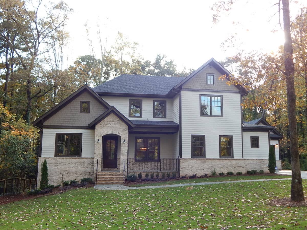 Peachtree Park home - Two story tan house with brick trim