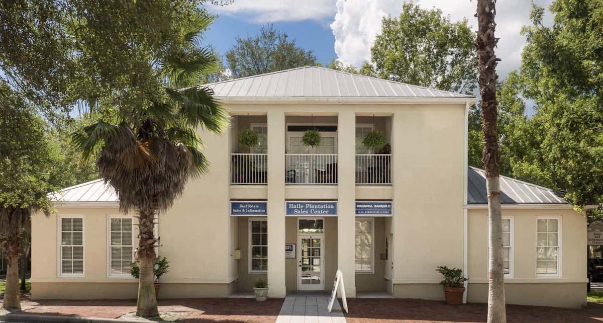 Two-story beige commecial space - Haile Plantation Village