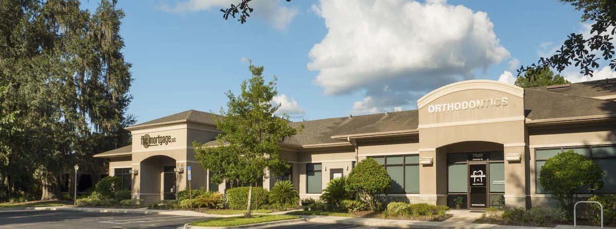 Beige commercial strip center - Tower Hill Office Park