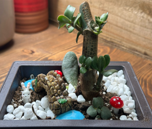 A group of men are standing on a golf course holding golf clubs.