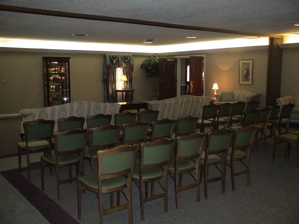 Four images of the Visitation Rooms at Hatmaker Funeral Home in Rocky Top, TN