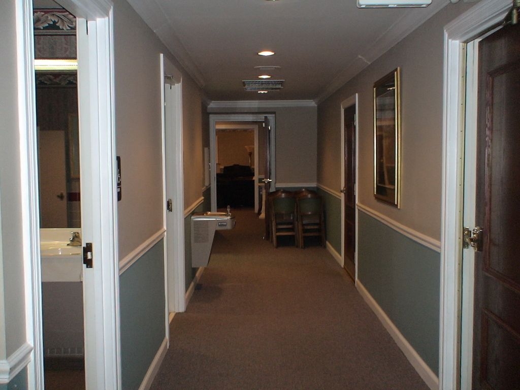 Eight (8) images of other parts of the facility at Hatmaker Funeral Home in Rocky Top, TN.
Hallway