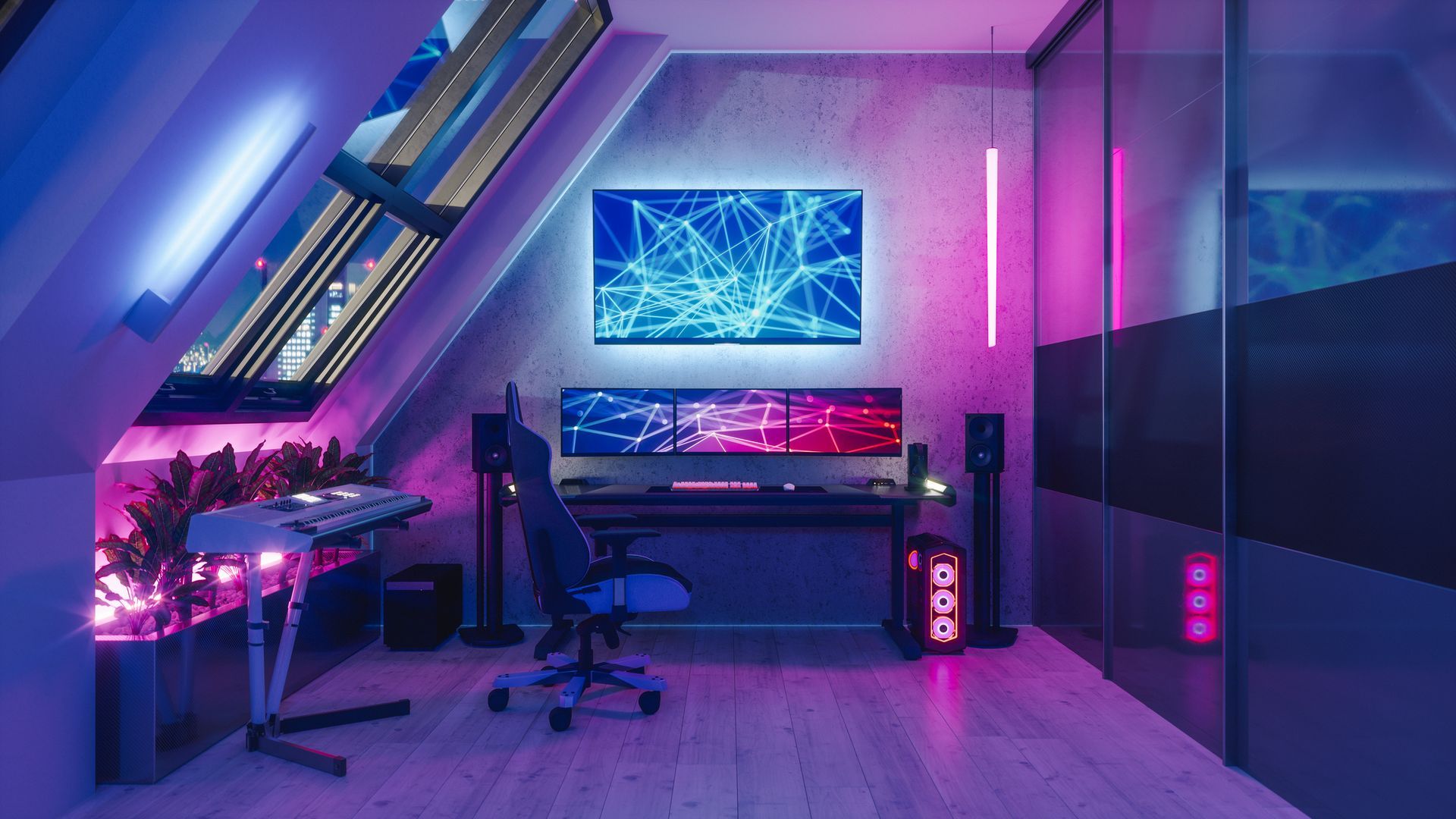 Gaming setup in an attic room with neon lights. Computer, monitors, keyboard, and plants are featured.