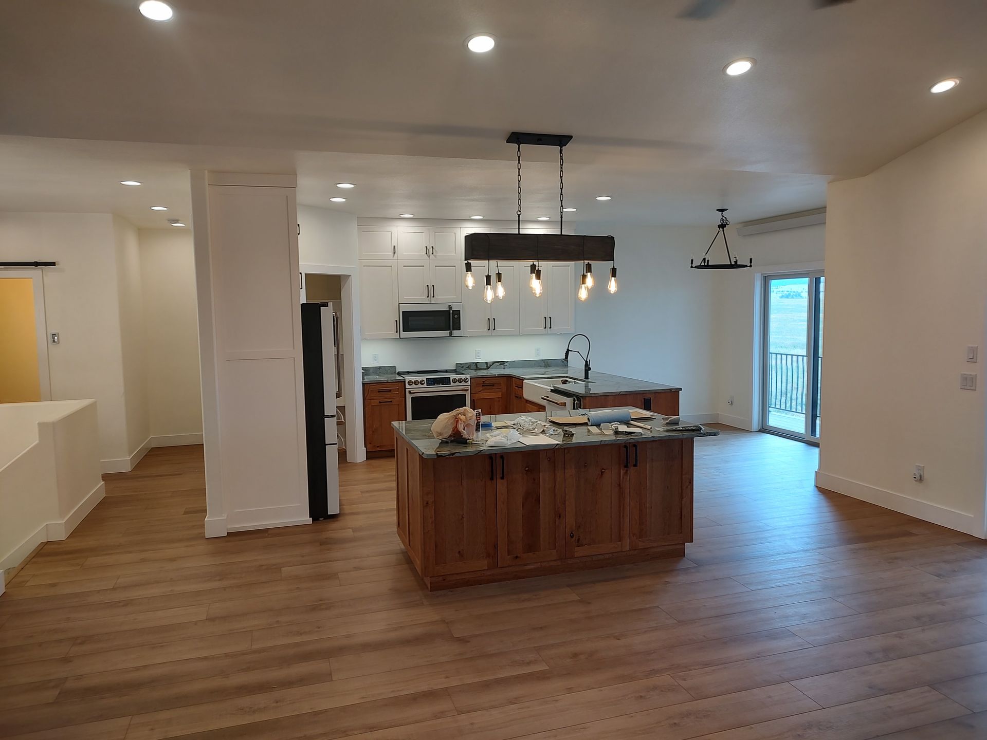 A kitchen with a large island in the middle of the room.