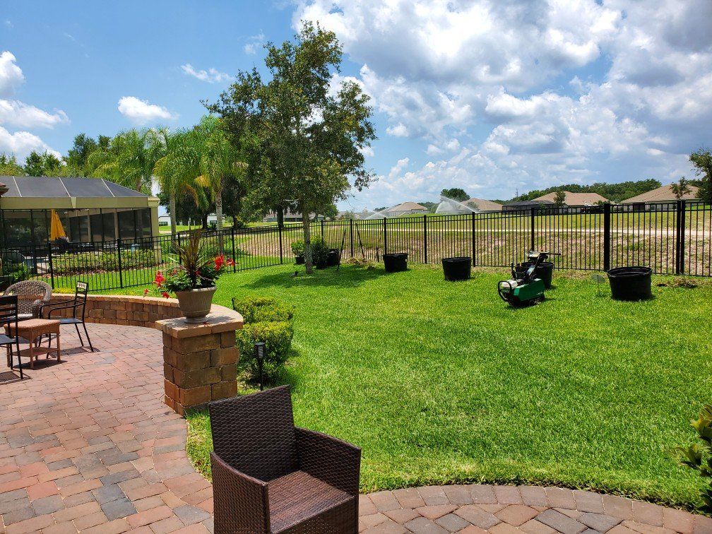 new landscaping around backyard fencing.