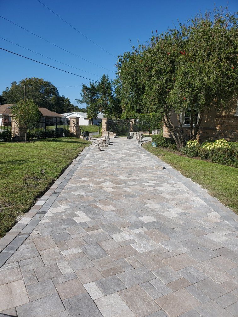 large paver driveway installation.