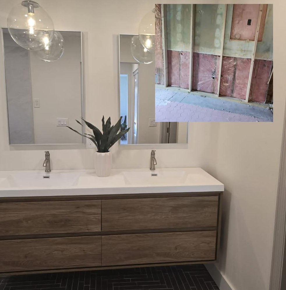 Modern bathroom with wooden vanity, two sinks, mirrors, and pendant lights. A construction-in-progress inset.