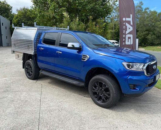 Blue Vehicle With Silver Cab — About Us in Noosaville QLD