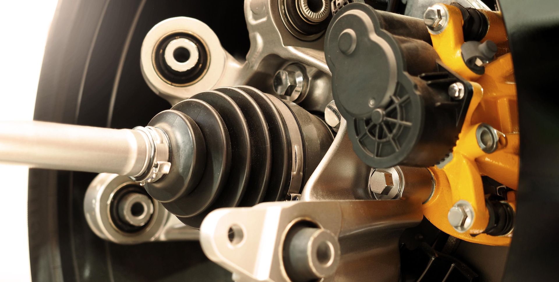 A close up of a car 's suspension system on a white background.