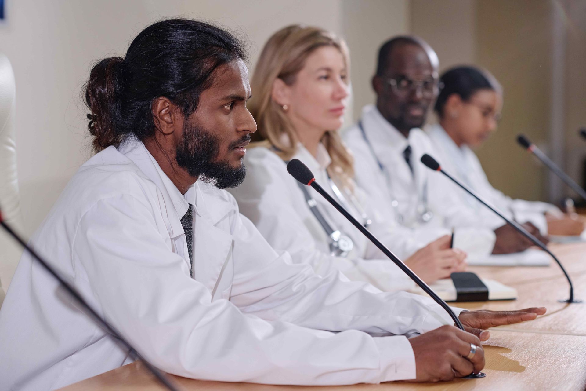 An example picture of a few medical professionals who don't meet their care standards during a hearing court case. Clicking this picture takes you to Medical Malpractice.