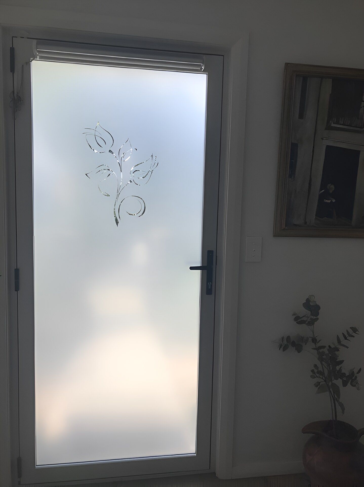 A Door With A Drawing Of A Flower On It — A & C Classic Window Tinting In Maitland Vale, NSW