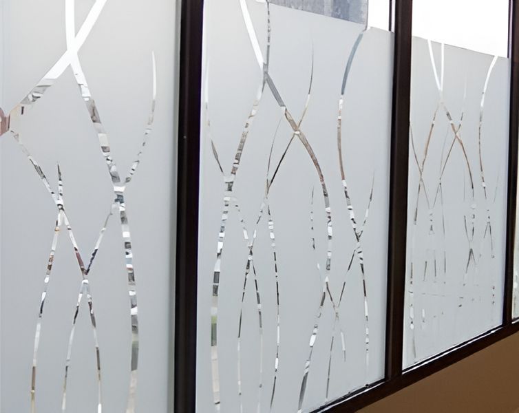 A Row Of Windows With A Frosted Glass Design On Them — A & C Classic Window Tinting In Rutherford, NSW