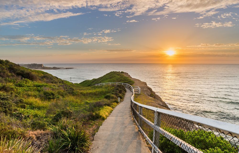 A Path Leading To The Ocean At Sunset — A & C Classic Window Tinting In Newcastle, NSW