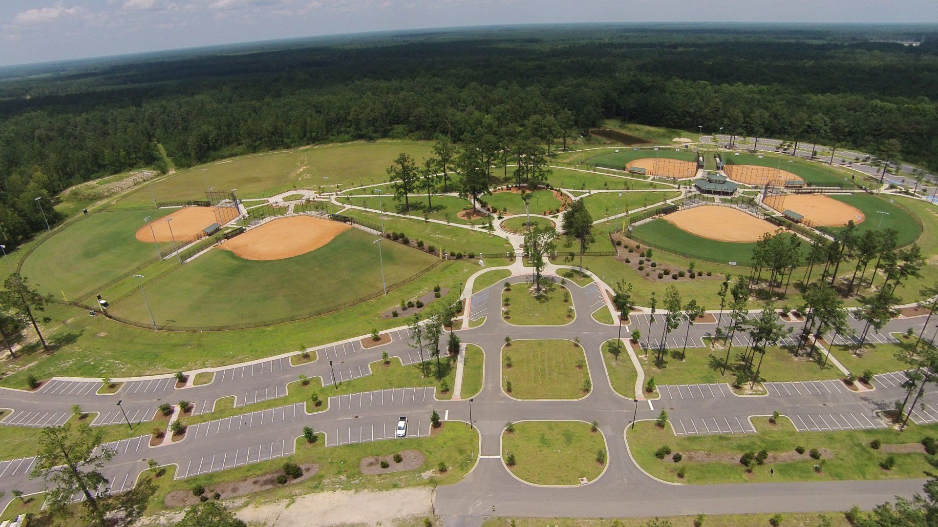 A man standing in front of a house with stairs