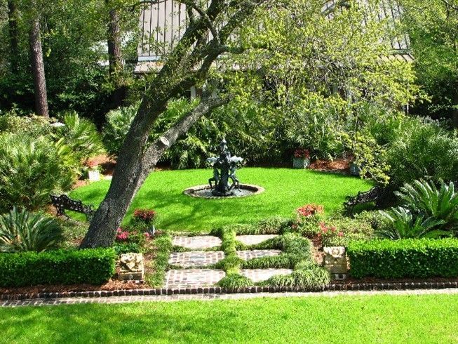 Freshly cut grass in a well-maintained yard by a residential landscape designer in Myrtle Beach, SC