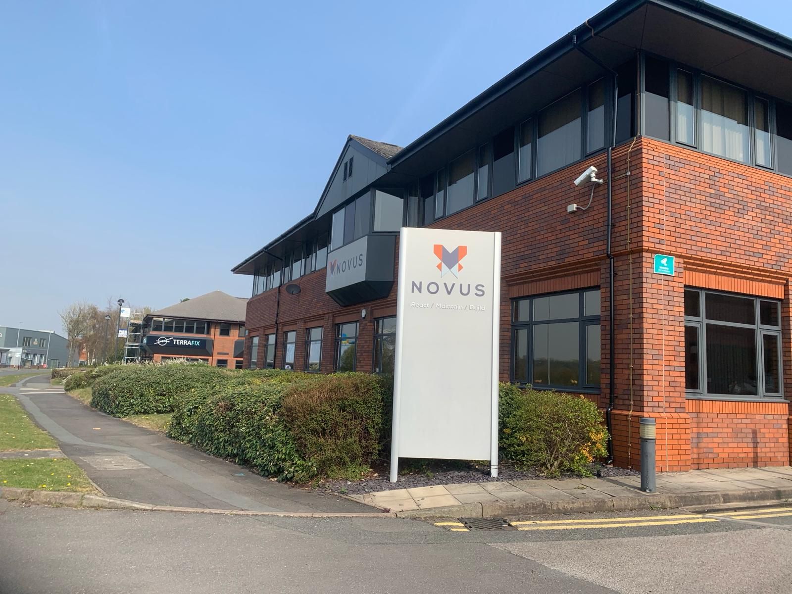 A large brick building with a sign that says nova on it