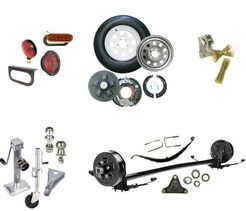 A bunch of different types of trailer parts on a white background.