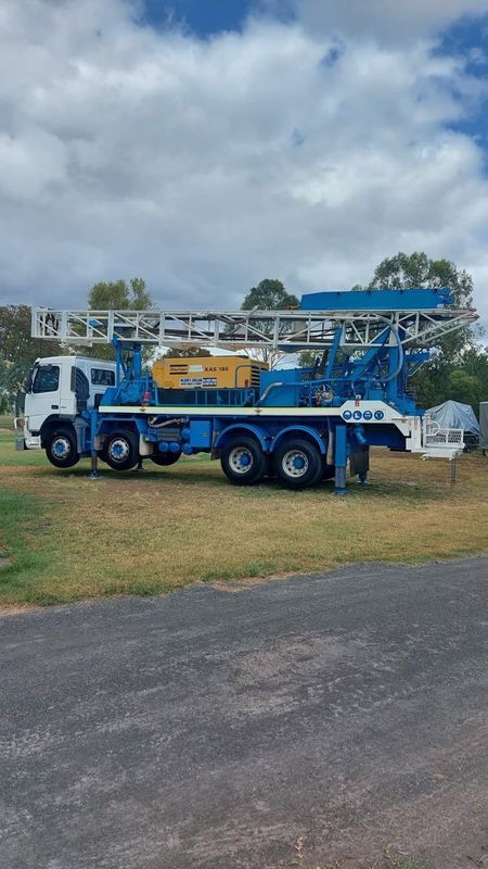 Blue and White Well Drilling Truck Parked — Wilson's Drilling in South Kolan, QLD