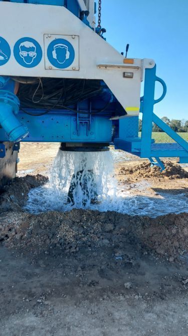 Water Gushing From a Well-drilling Machine — Wilson's Drilling in South Kolan, QLD
