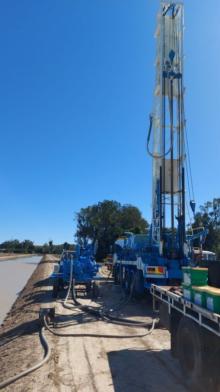Blue Drilling Rig on a Dirt Road — Wilson's Drilling in South Kolan, QLD