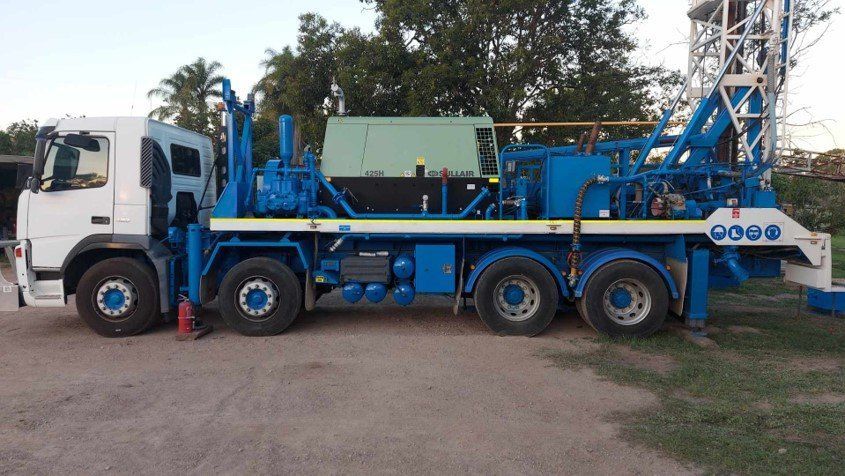 Blue and White Drilling Rig Mounted on a Truck — Wilson's Drilling in South Kolan, QLD