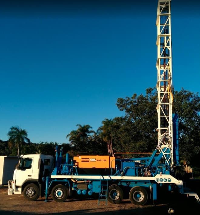 Drilling Rig on a Truck, Blue and White, Under a Clear Blue Sky — Wilson's Drilling in South Kolan, QLD