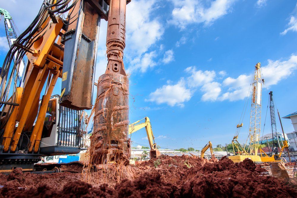 Construction Site With Heavy Machinery — Wilson's Drilling in South Kolan, QLD