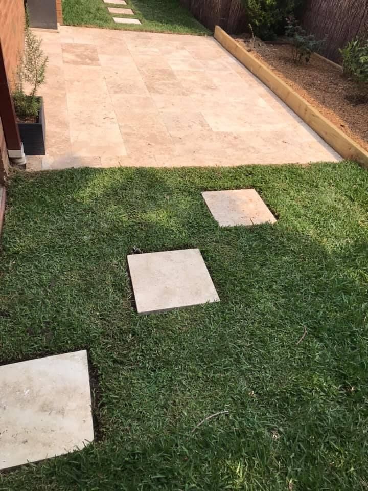 A Lawn with a Patio and Stepping Stones in it | Central Coast, NSW | Budget Lawns Plus