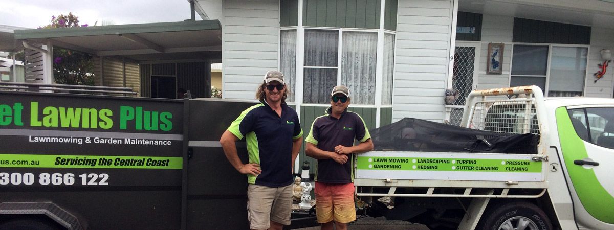 Two Men are Standing in Front of a Truck that says Lawn Plus | Central Coast, NSW | Budget Lawns Plus